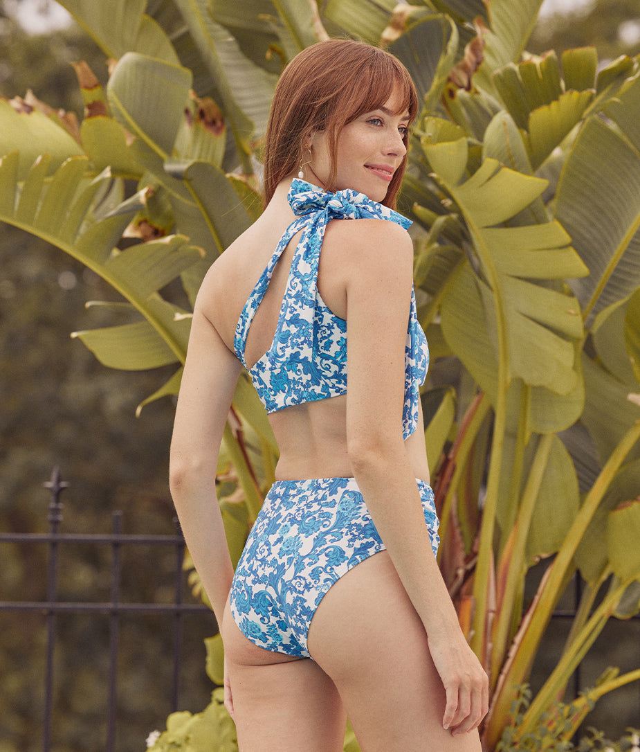 Model in Bikini Bottom, The Ruched High Leg High Rise Bottom - Garden Floral in White Sand & Pacific (Blue Floral Patter on White)